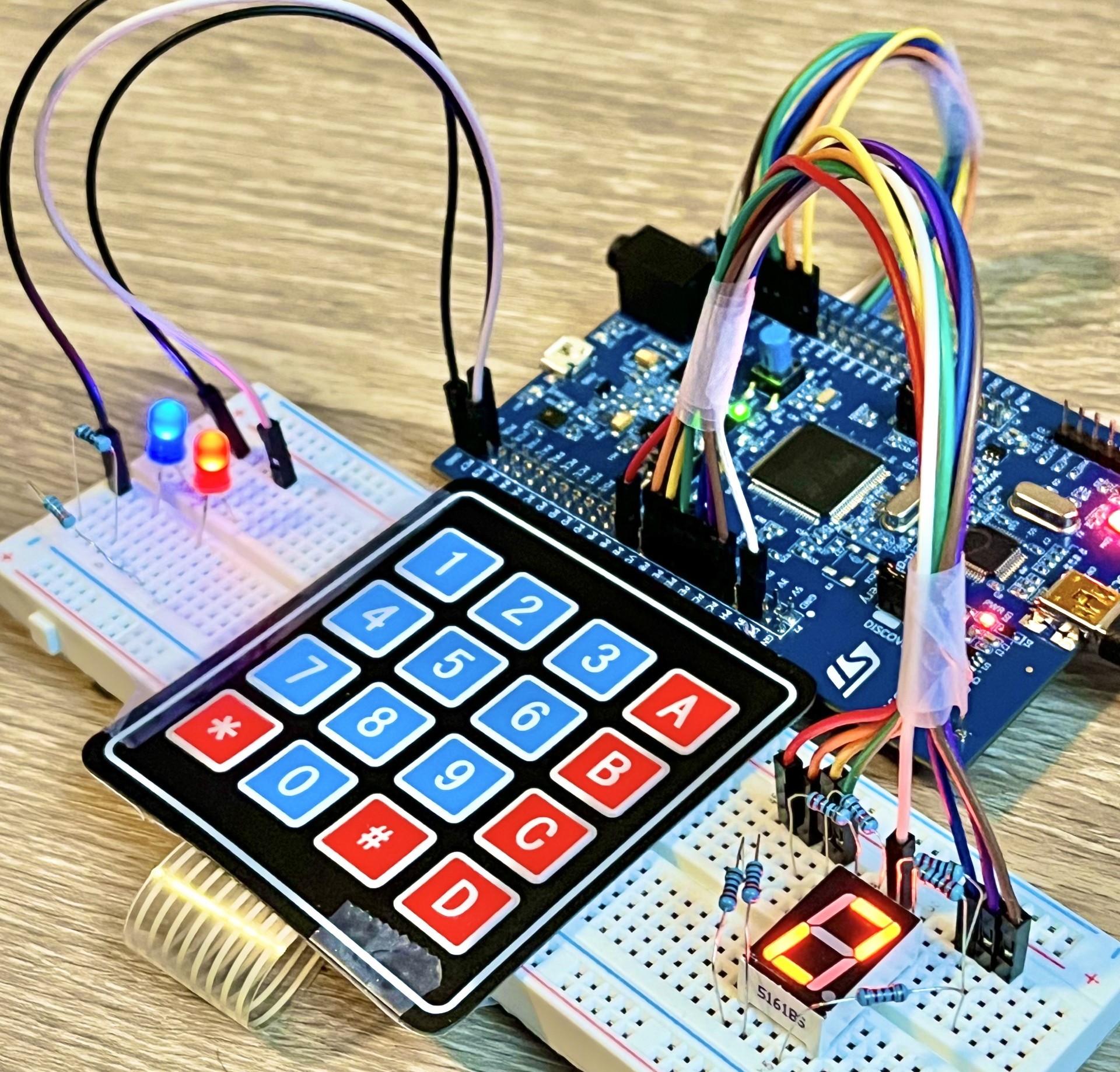 microcontroller project with breadboard and serial numberpad